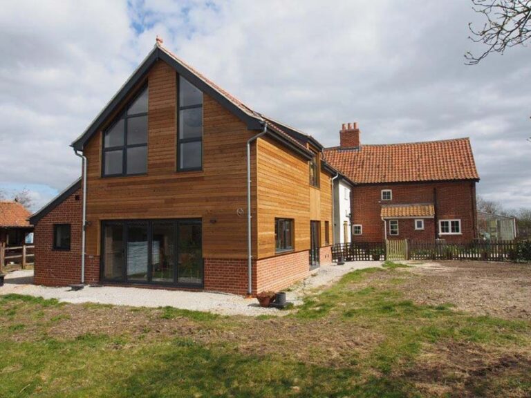 Two Storey Contemporary Extension to Grade 2 Listed Farmhouse in Norfolk