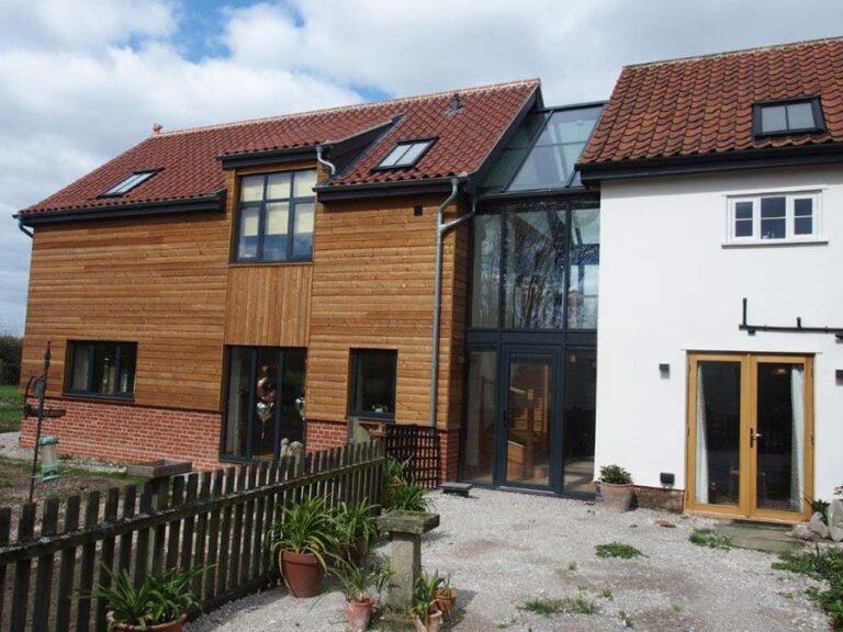 Two Storey Contemporary Extension to Grade 2 Listed Farmhouse in Norfolk
